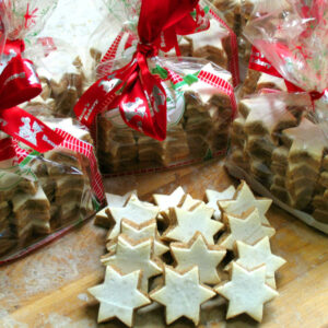 Picture of star cookies on the table and inside small bags